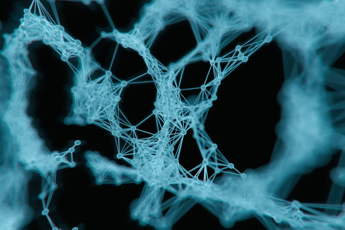 3D rendering of a complex blue network structure resembling connections in a neural network.