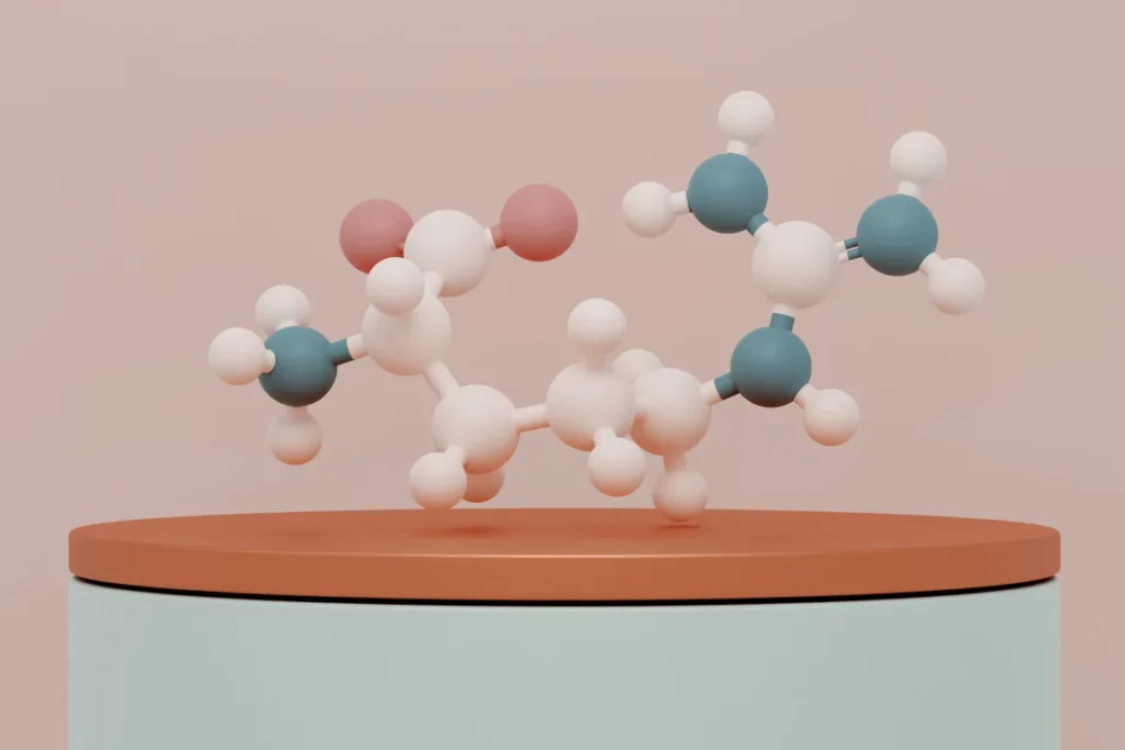 3D model of a molecular structure with blue and pink spheres on a minimalist platform.