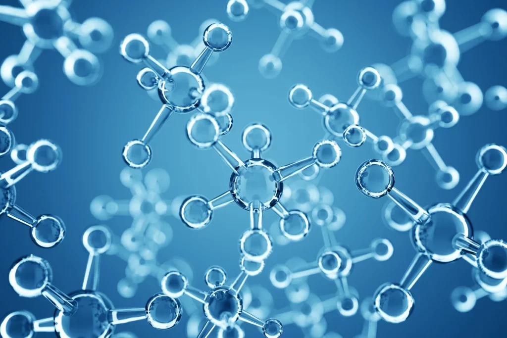 Abstract close-up of transparent molecules interconnected, set against a gradient blue background, symbolizing scientific research and chemistry.