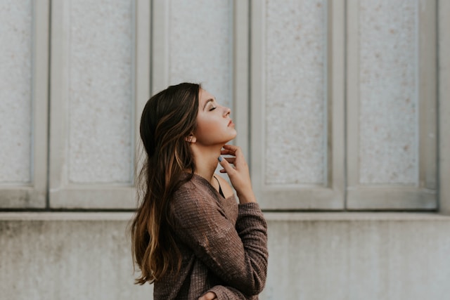 Side profile of woman looking contemplative