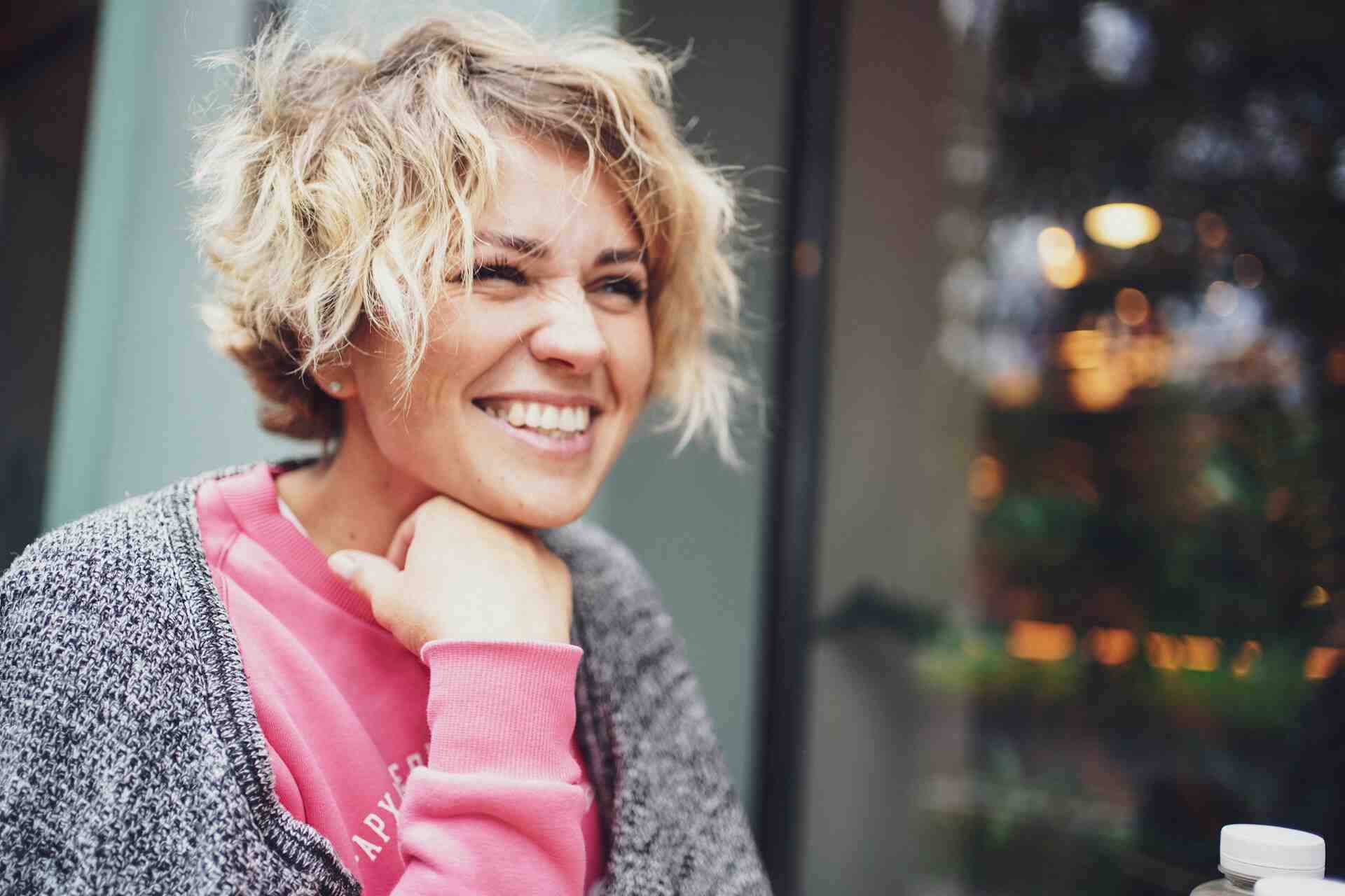 Smiling middle-aged woman with short hair